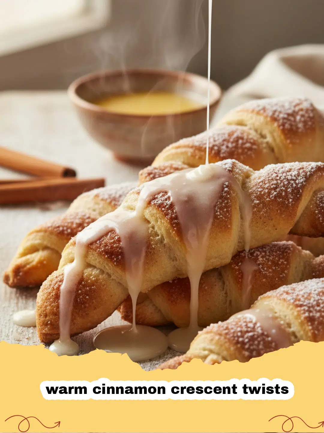 Close-up of freshly baked warm cinnamon crescent twists, glistening with glaze, on a cooling rack.