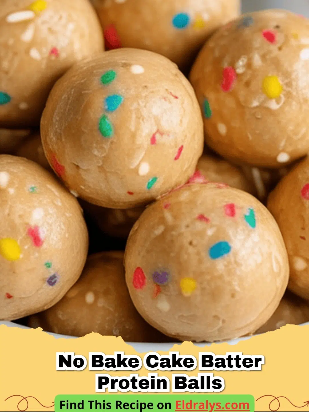 Close up of No Bake Cake Batter Protein Balls with rainbow sprinkles on a white plate