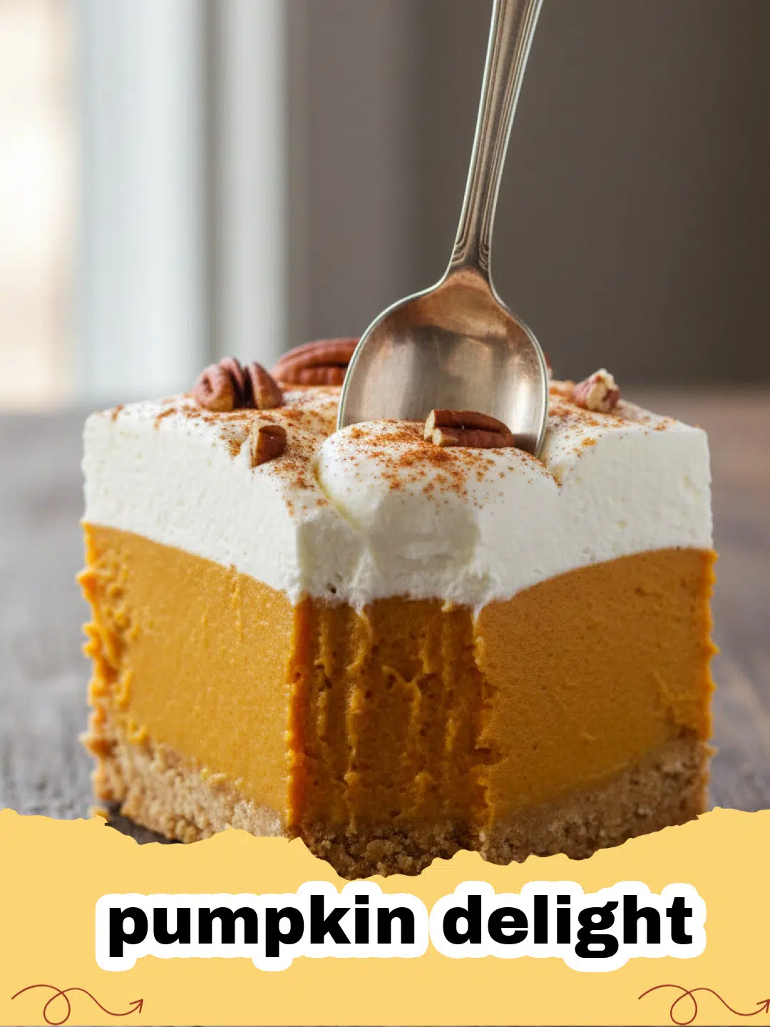 A square slice of creamy no-bake pumpkin delight with whipped topping and pecan garnish on a white plate.