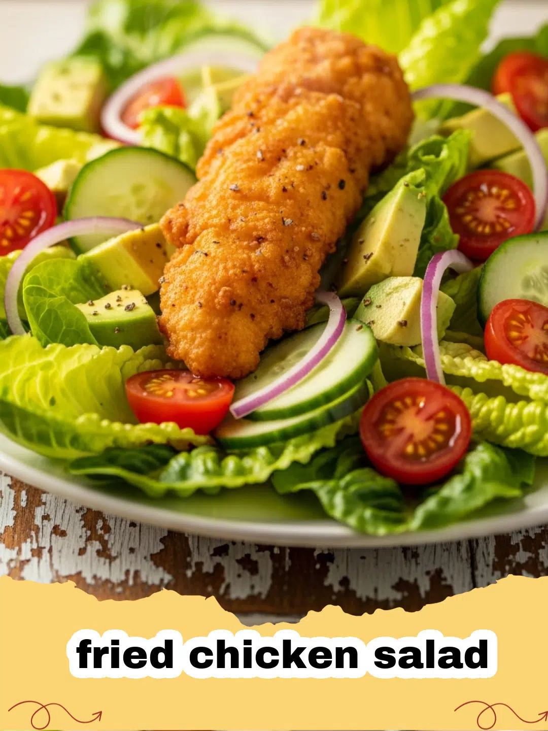 A beautiful fried chicken salad bowl with crispy golden chicken pieces, fresh greens, and honey mustard dressing.