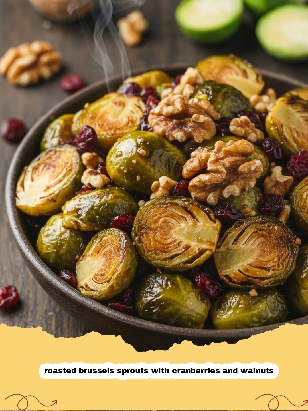A close up view of roasted brussels sprouts with cranberries and walnuts on a serving platter.