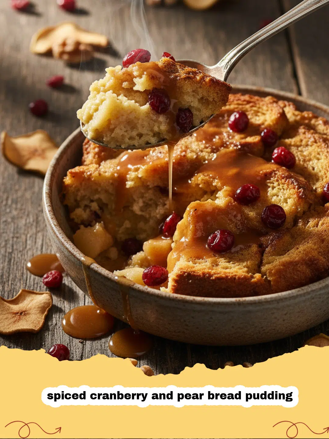 A golden-brown spiced cranberry and pear bread pudding in a white ceramic dish, garnished with fresh mint.