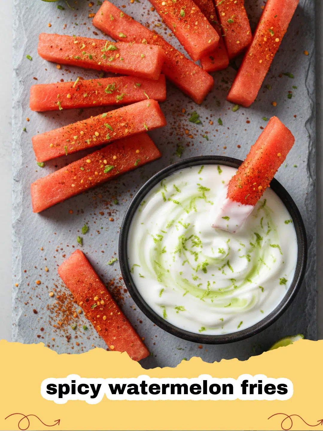 Close-up of spicy watermelon fries seasoned with chili-lime and mint, arranged like french fries on a plate.