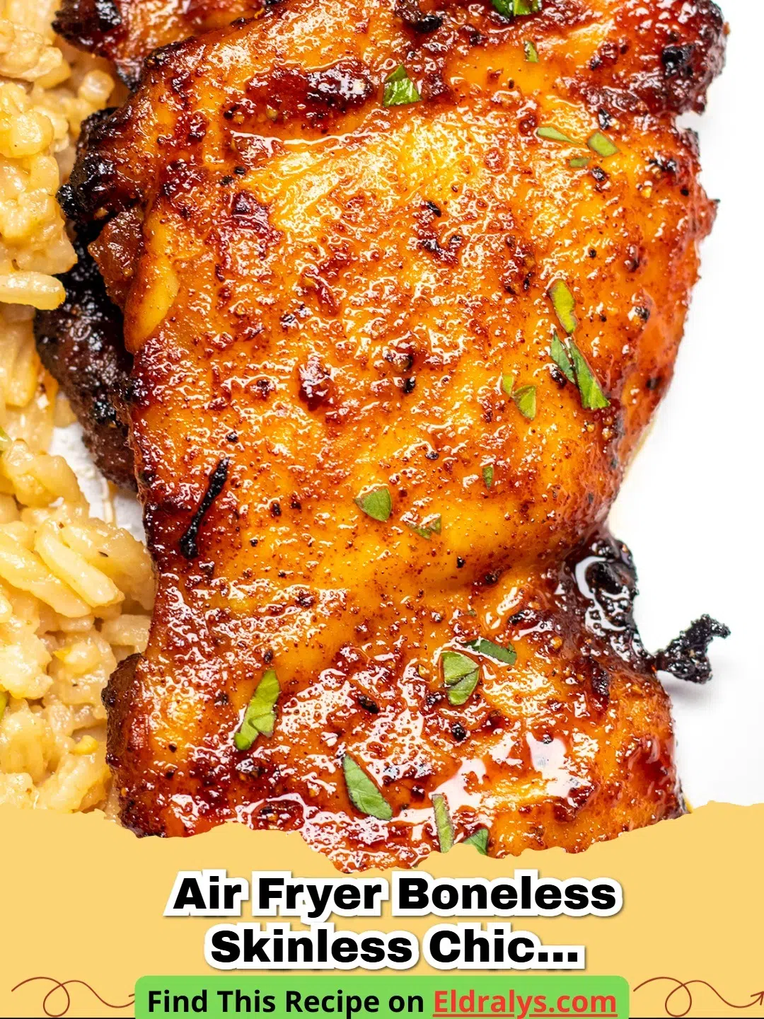 Golden brown and juicy Air Fryer Boneless Skinless Chicken Thighs served on a white plate with fresh herbs.