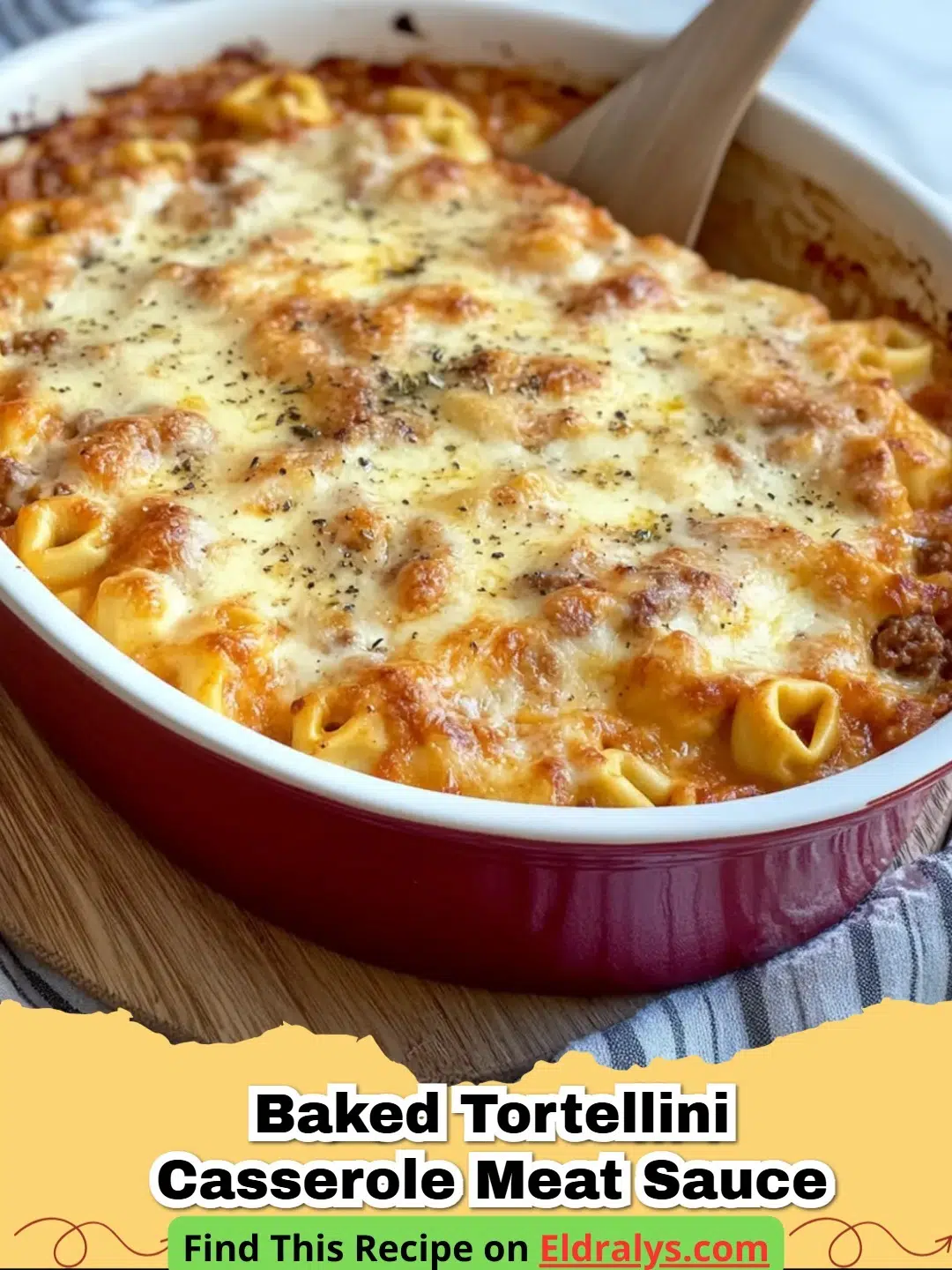A bubbling hot Baked Tortellini Casserole Meat Sauce topped with melted cheese and fresh parsley.