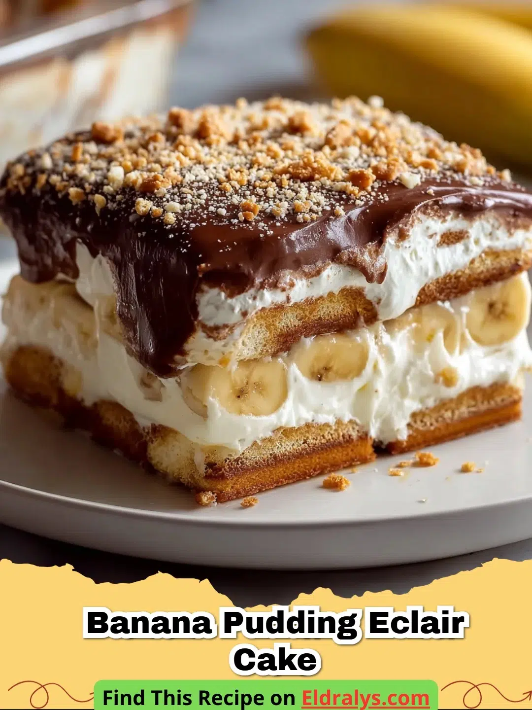 A close up shot of a sliced Banana Pudding Eclair Cake showing layers of crackers, pudding, and bananas.