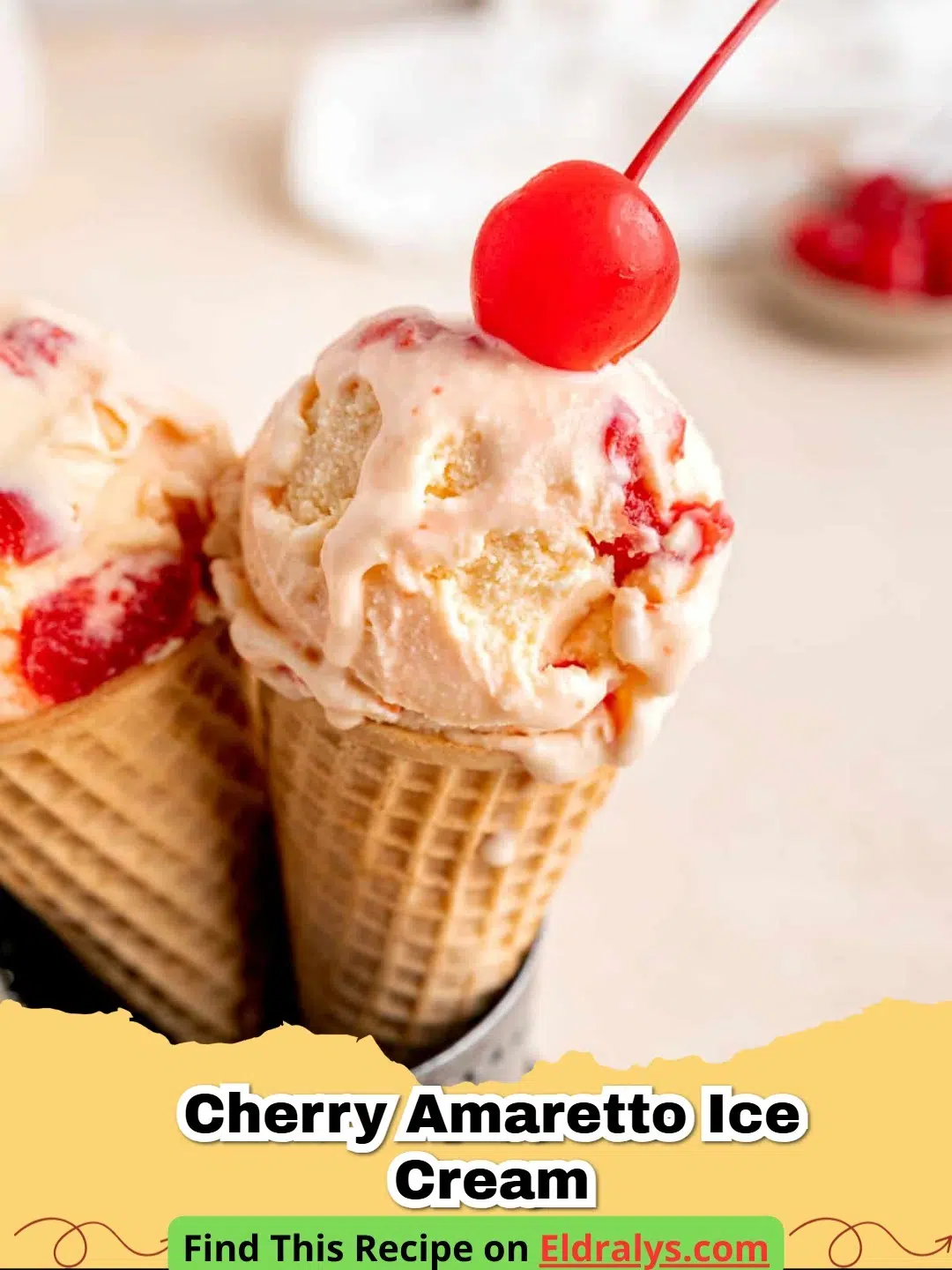 A scoop of creamy Cherry Amaretto Ice Cream with dark cherry chunks in a white bowl.