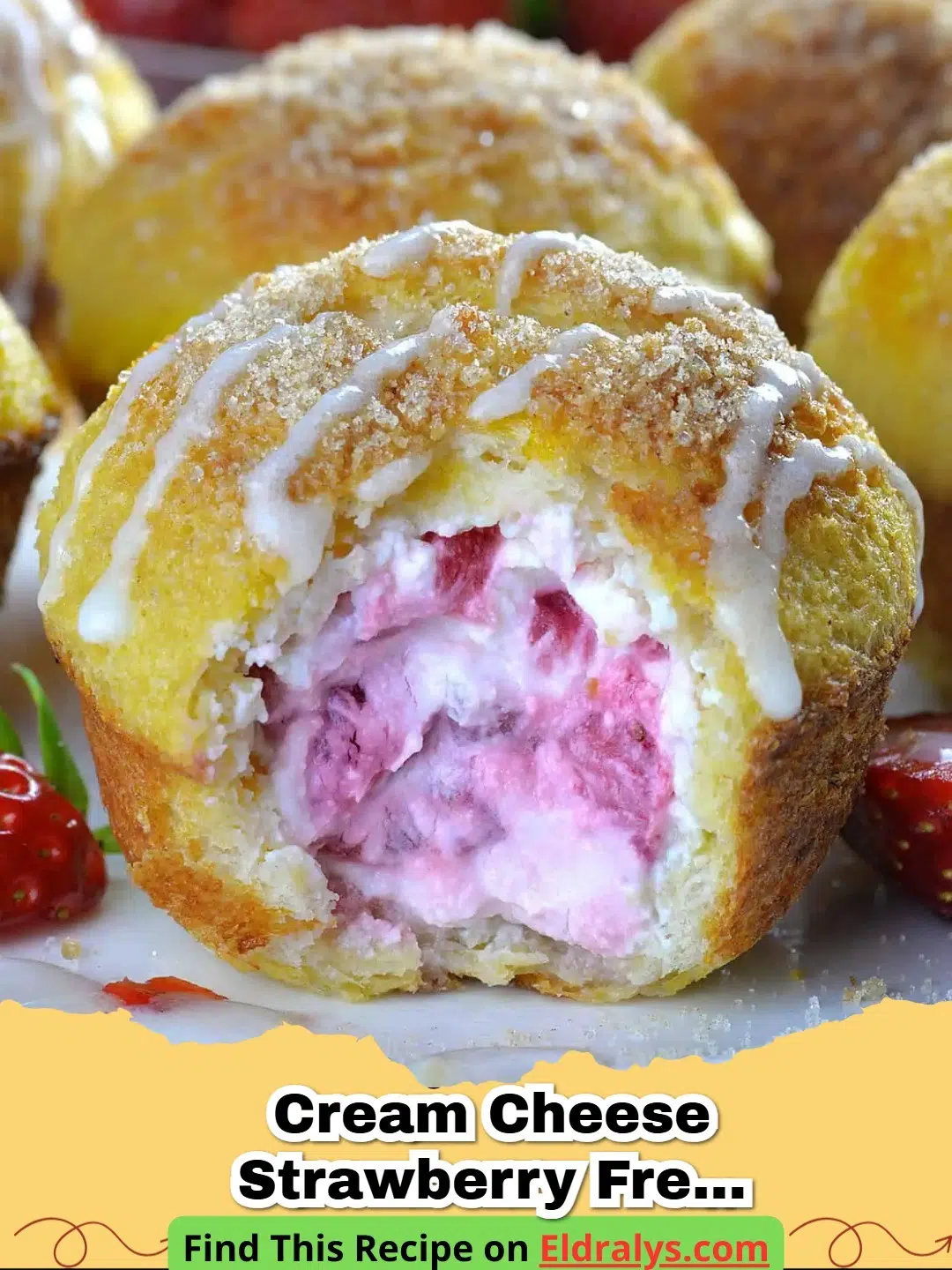 Golden brown Cream Cheese Strawberry French Toast Muffins topped with fresh berries
