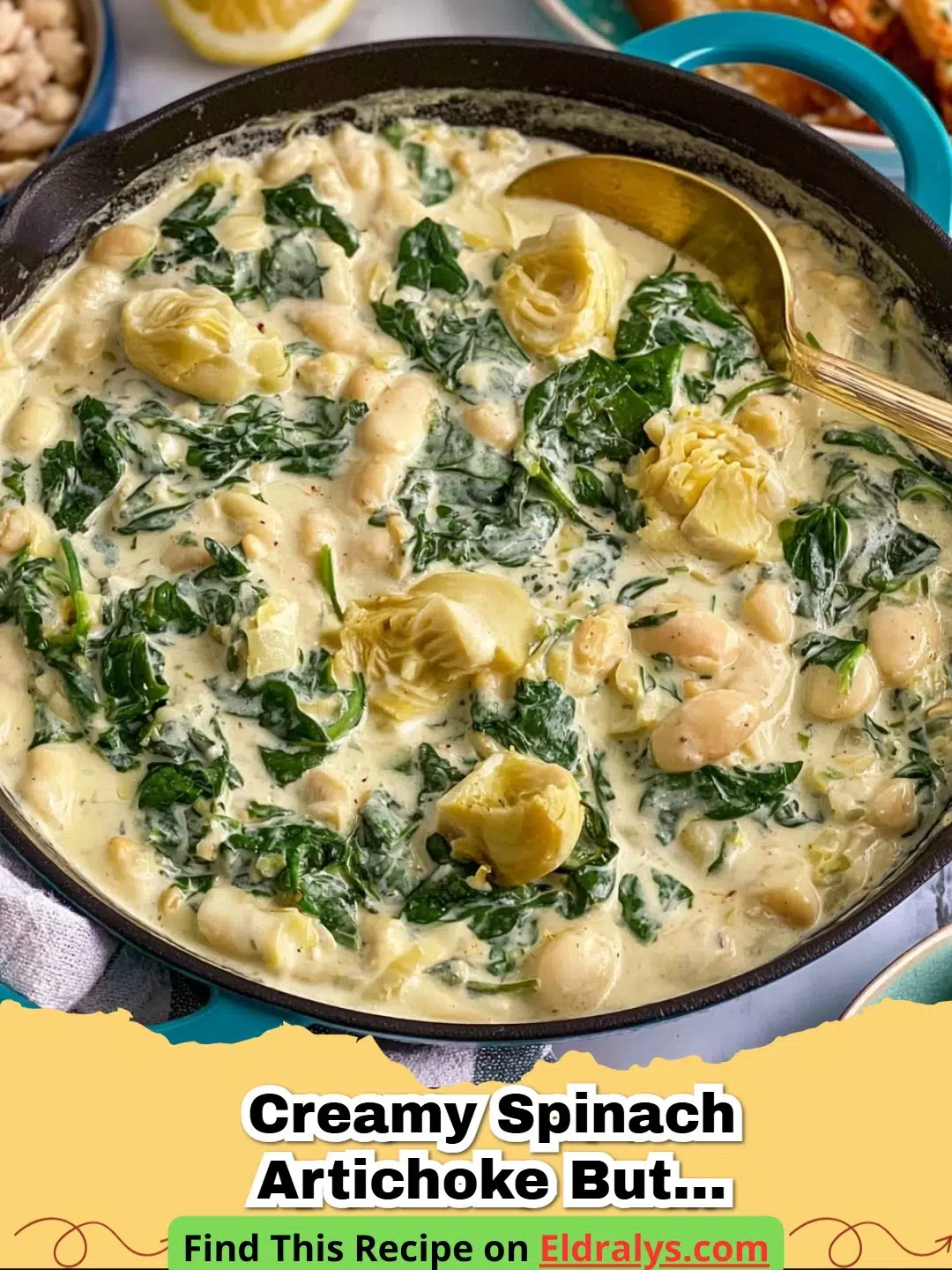A close up shot of Creamy Spinach Artichoke Butter Beans in a black skillet with a wooden spoon