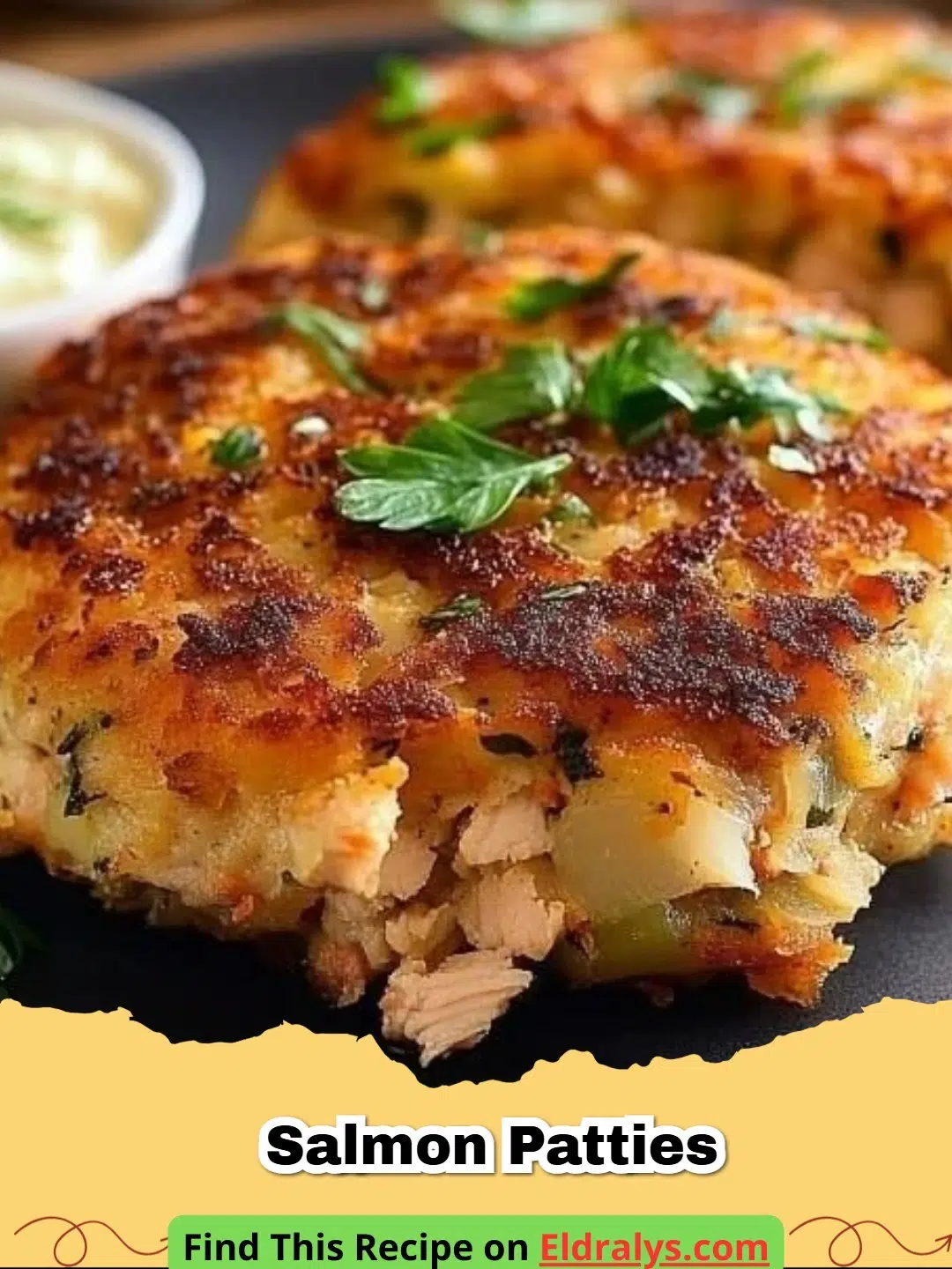 Golden brown crispy Salmon Patties served on a white plate with lemon wedges