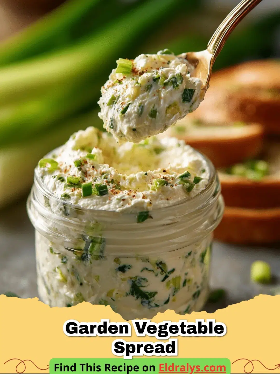 A close-up shot of creamy Garden Vegetable Spread with colorful vegetable flecks served on a toasted bagel.
