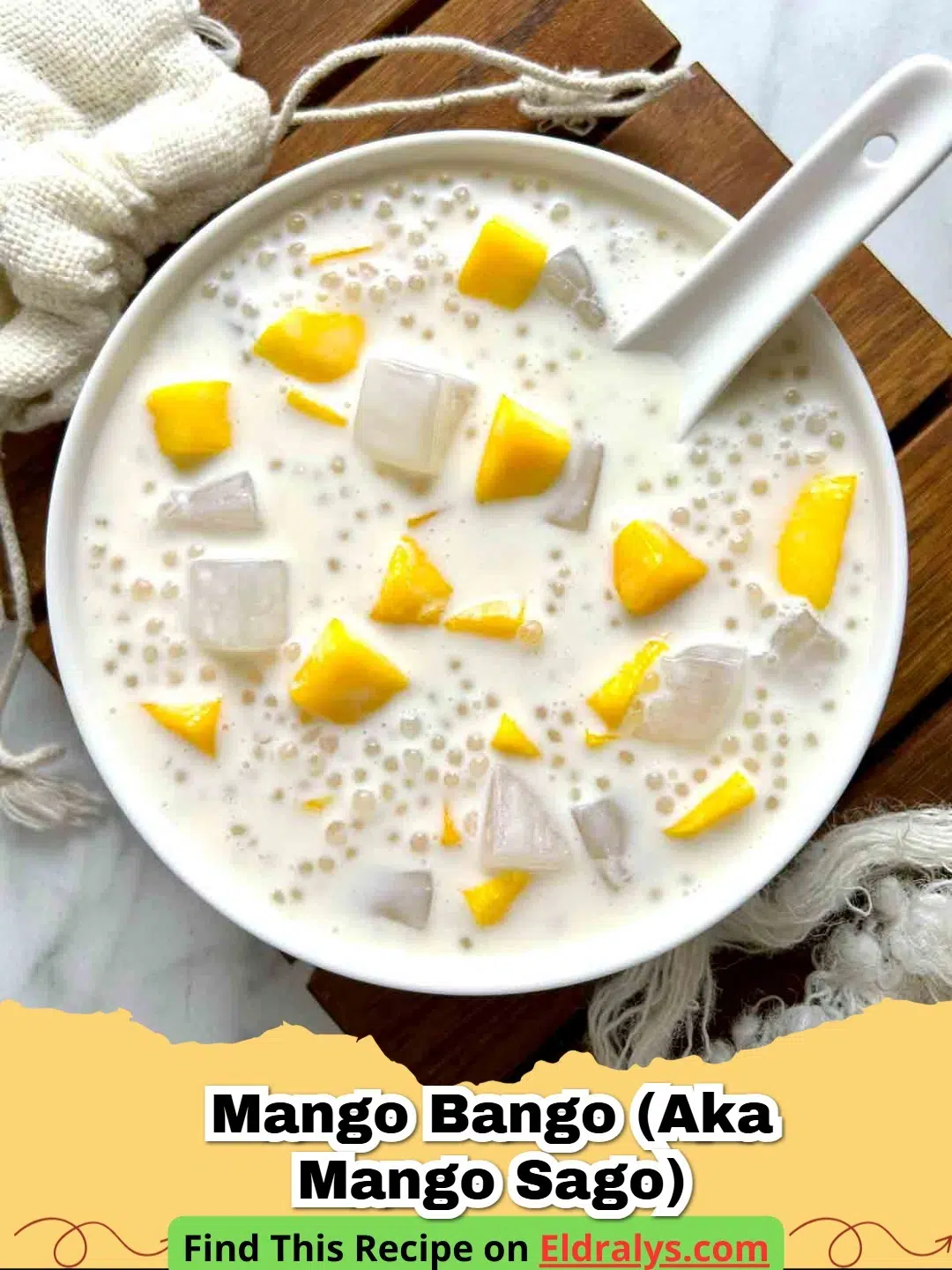 A close up view of Mango Bango (aka Mango Sago) served in a glass bowl with a mint garnish