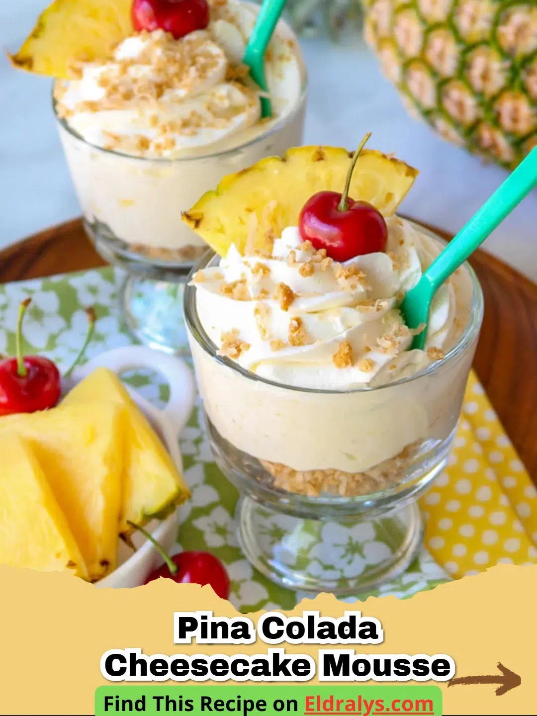 A close up of Pina Colada Cheesecake Mousse in a glass bowl with toasted coconut garnish.