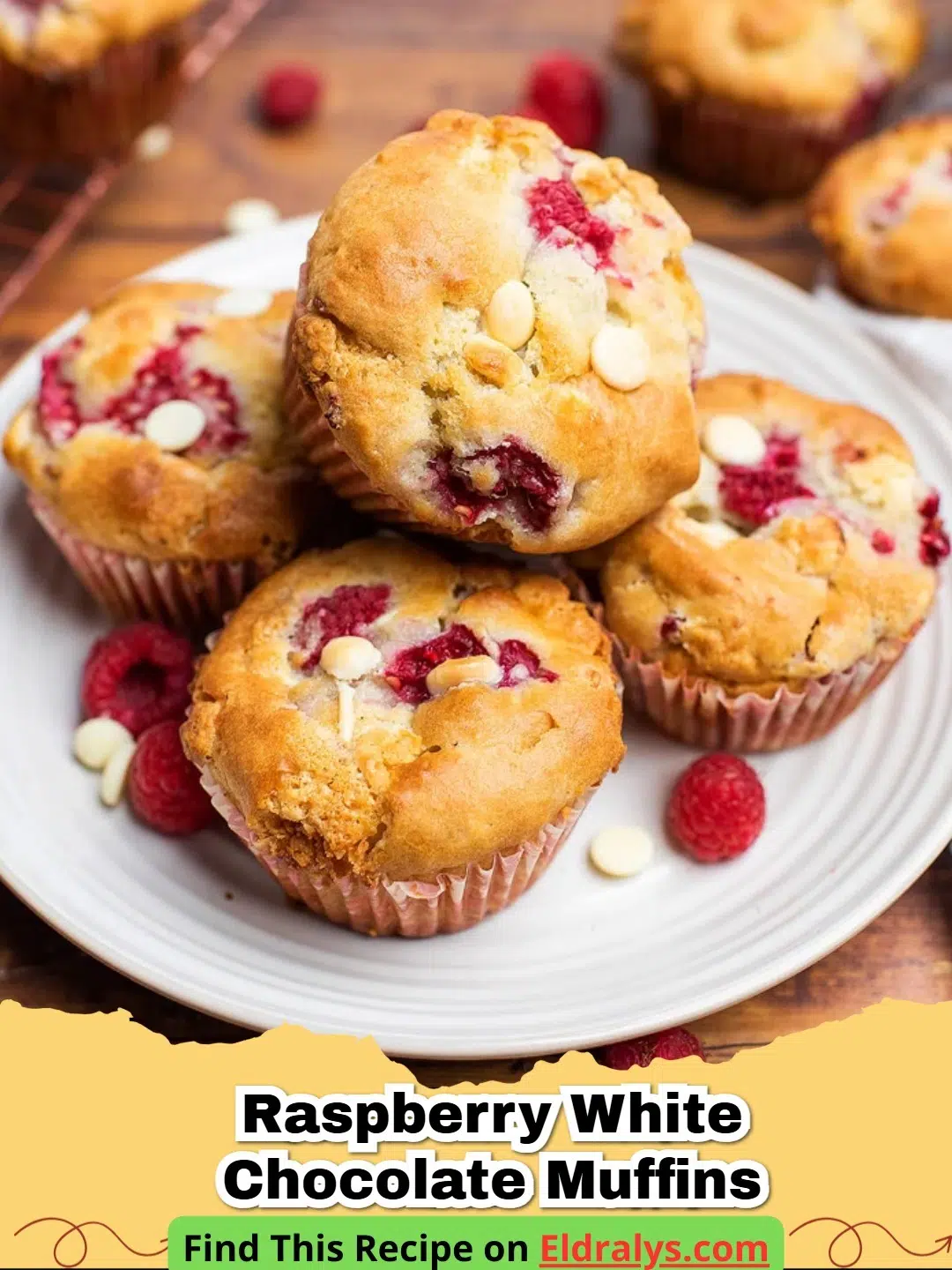 Close up of a Raspberry White Chocolate Muffin with melted chocolate and visible berries.