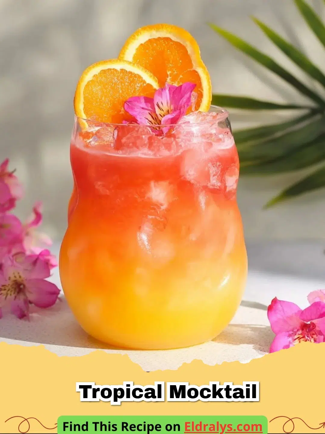 A vibrant Tropical Mocktail served in a hurricane glass with a pineapple wedge and mint garnish.