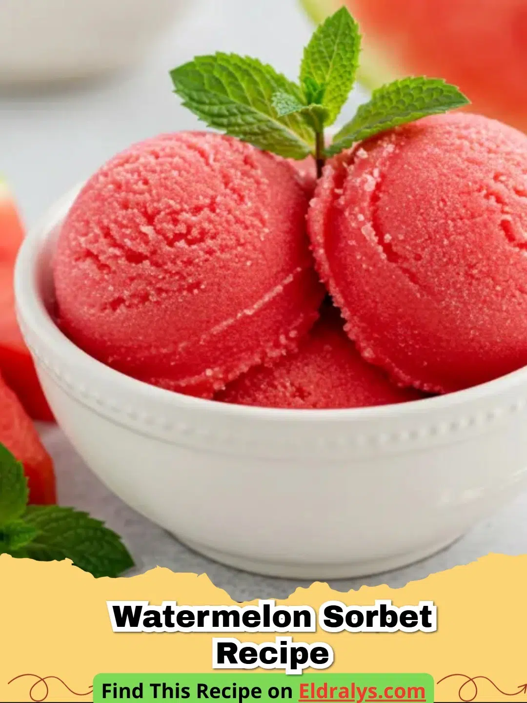 Watermelon Sorbet Recipe - A close up of a scoop of vibrant pink Watermelon Sorbet in a glass bowl garnished with mint.