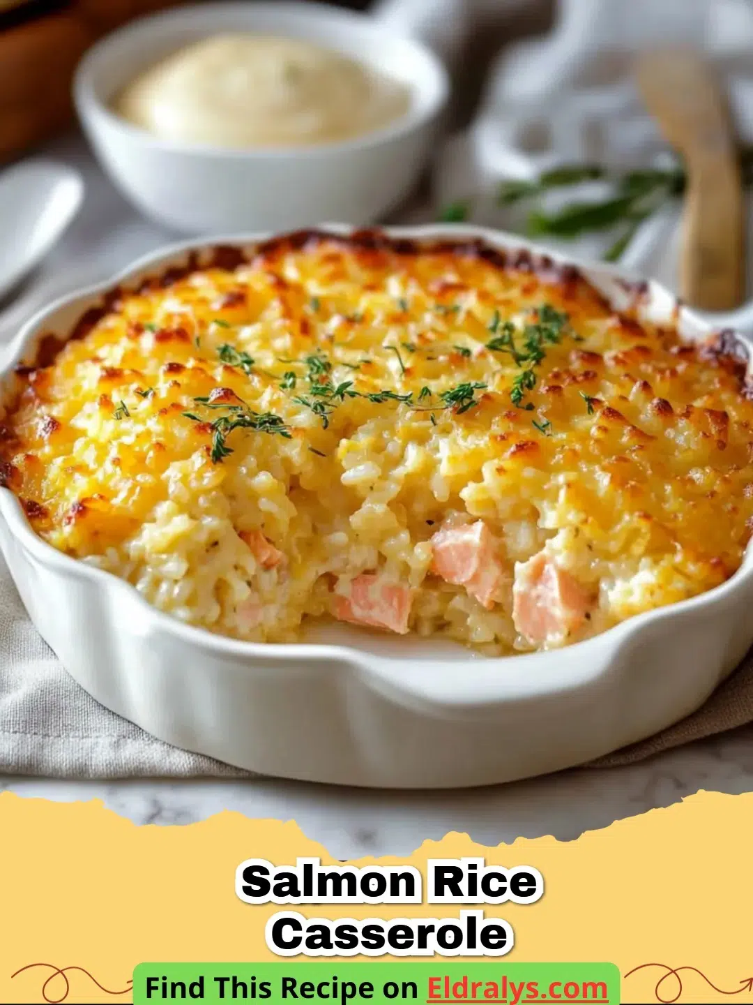 A golden-brown Salmon Rice Casserole in a white ceramic dish