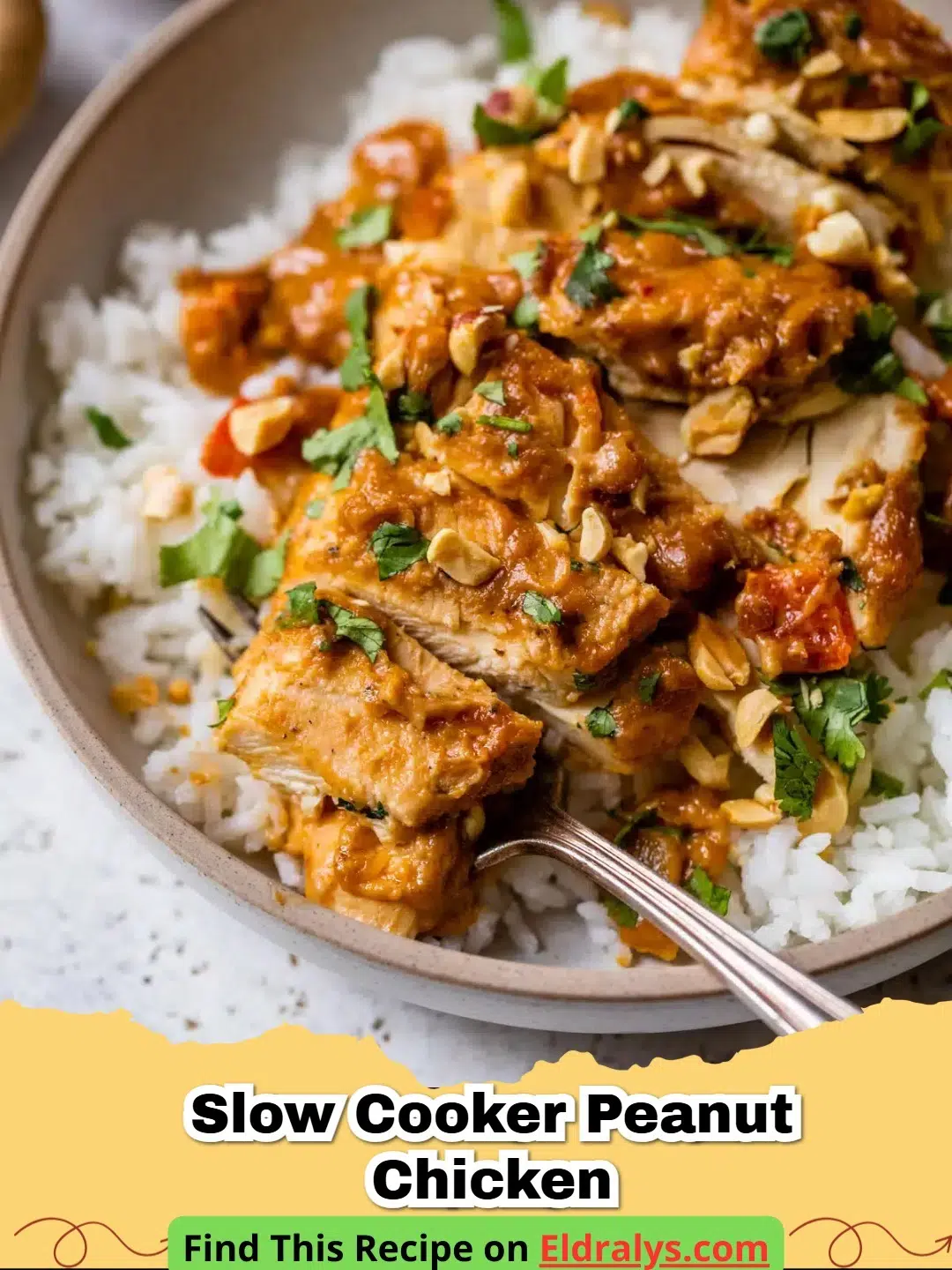 Slow Cooker Peanut Chicken served over white rice with cilantro garnish