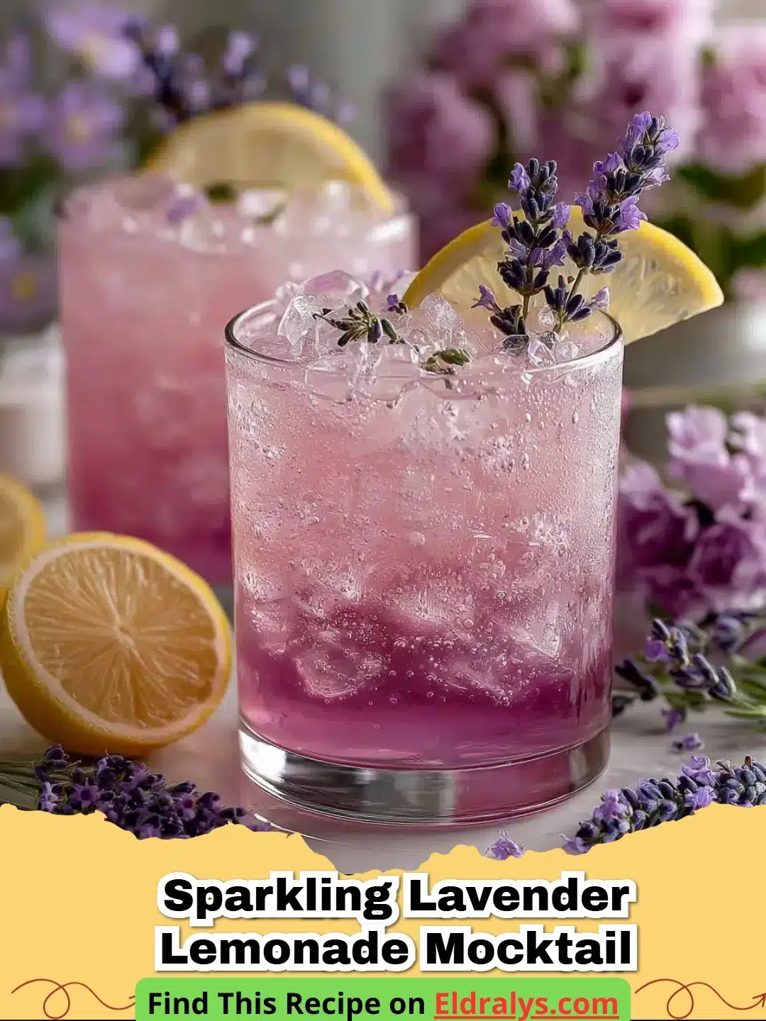 A glass of Sparkling Lavender Lemonade Mocktail garnished with a sprig of lavender and a lemon slice on a summer table.
