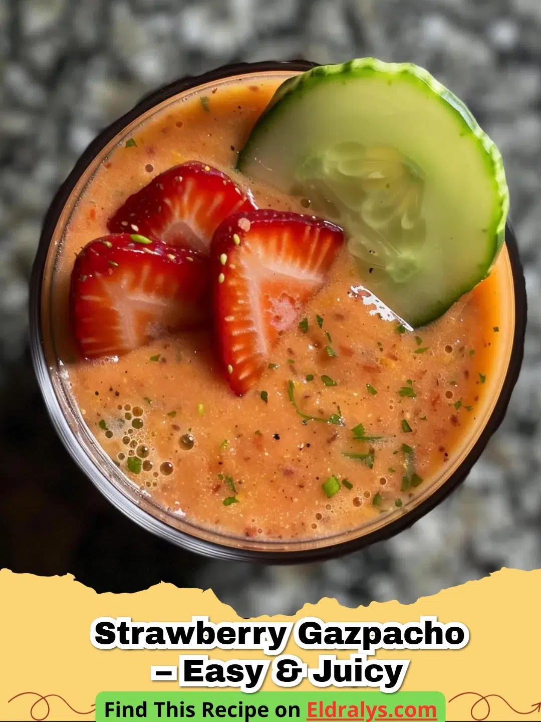 A vibrant bowl of Strawberry Gazpacho – EASY & JUICY garnished with fresh basil.