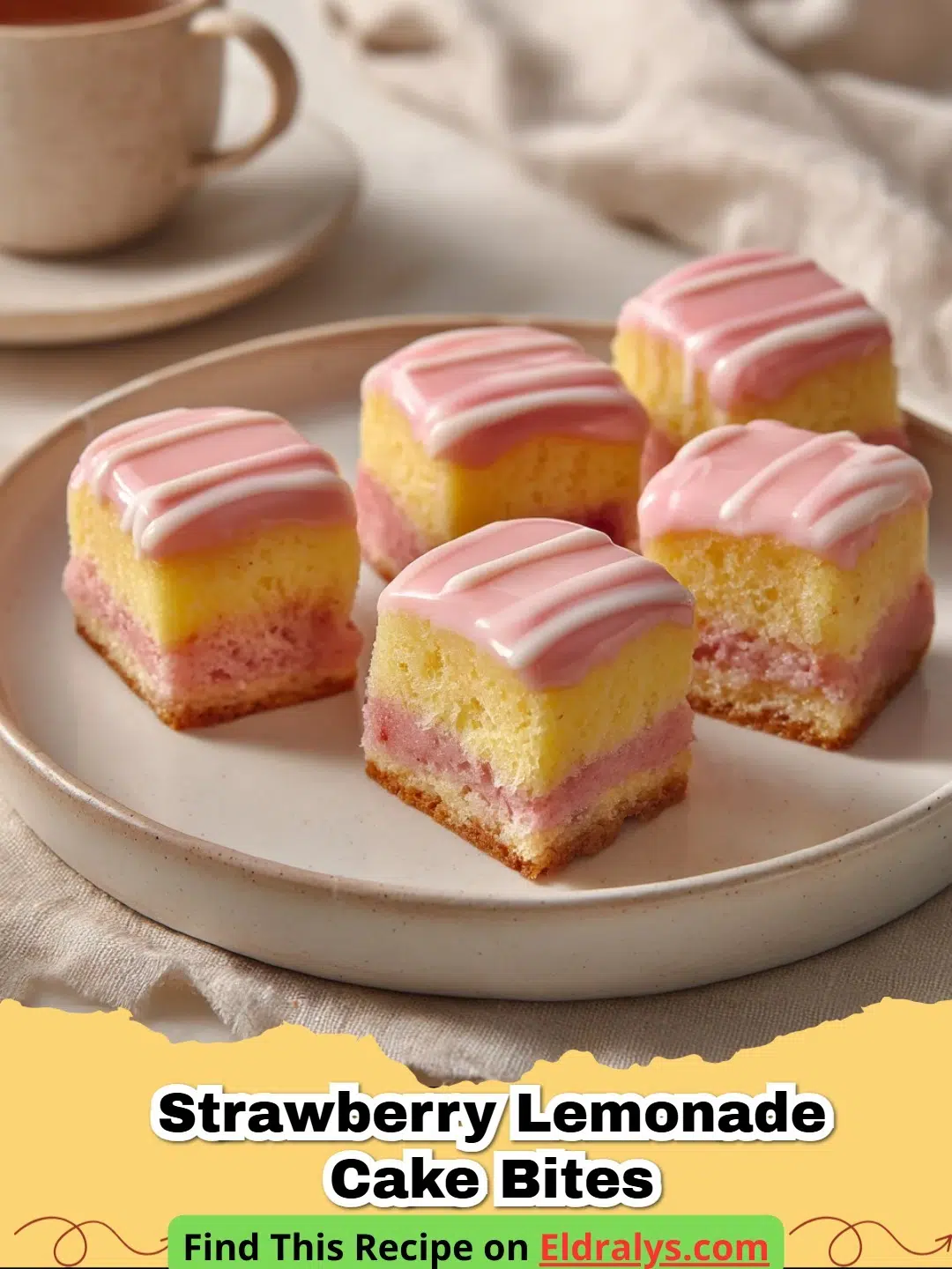 Strawberry Lemonade Cake Bites served on a white platter with fresh lemon slices.