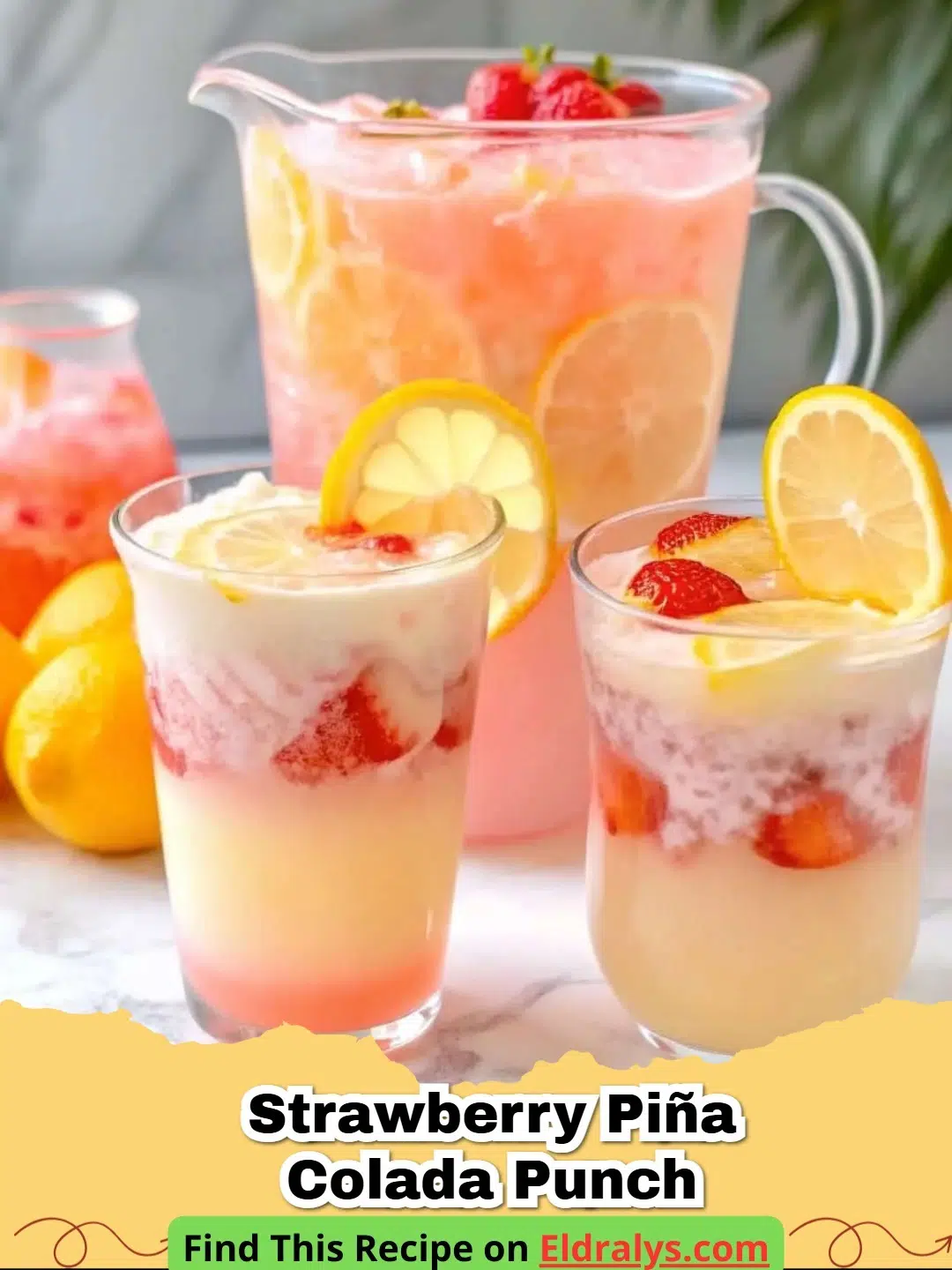 A large bowl of creamy Strawberry Piña Colada Punch with fresh fruit garnishes.