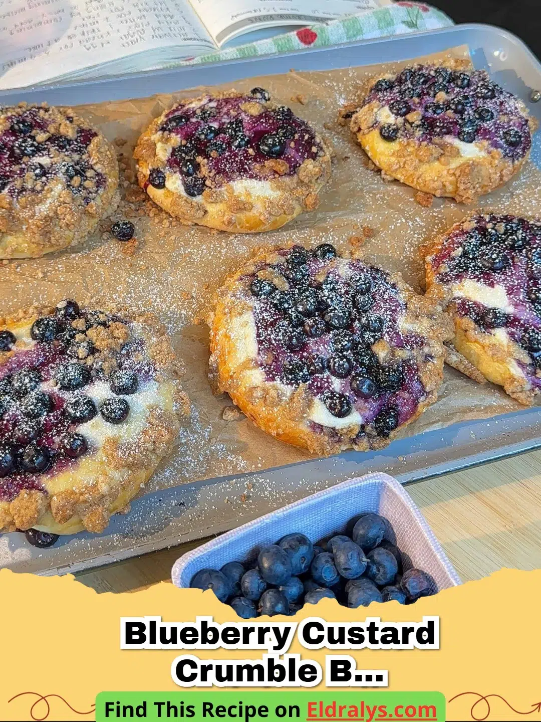 Close up of Blueberry Custard Crumble Buns (Bakery-Style with Cream Cheese Filling) with golden crumble and visible blueberries.