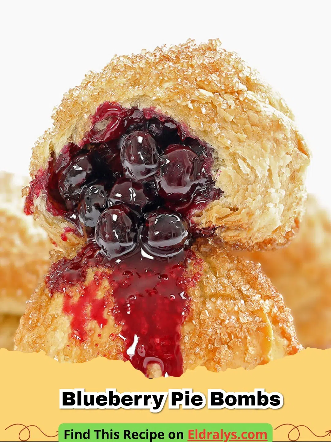 Golden brown Blueberry Pie Bombs drizzled with white glaze on a baking sheet.