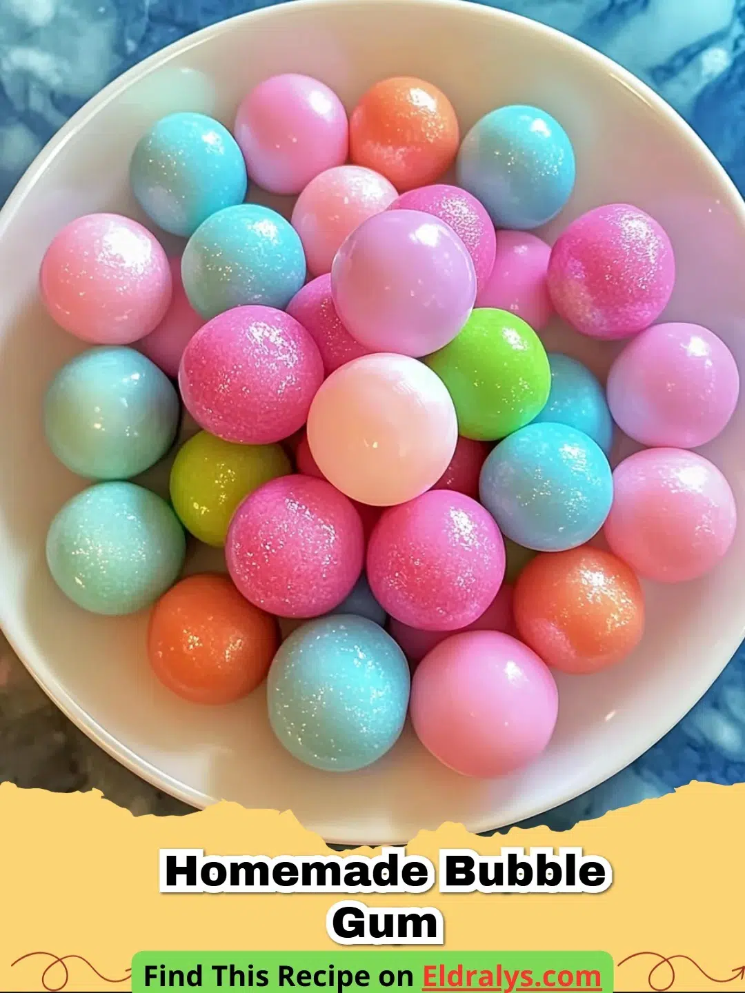 A close-up of pink Homemade Bubble Gum pieces dusted with powdered sugar.
