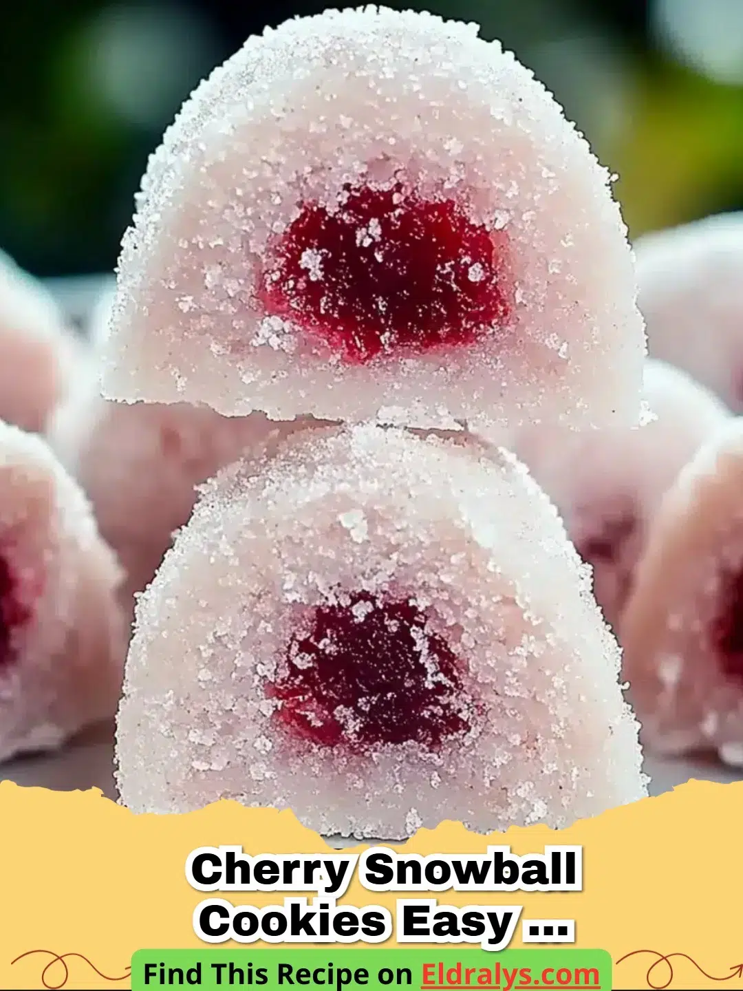 A pile of white Cherry Snowball Cookies with one broken open to show the pink cherry center.