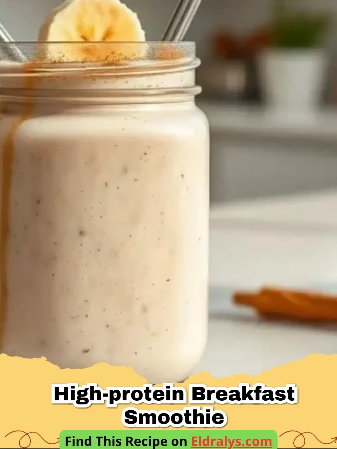 A vibrant High-Protein Breakfast Smoothie in a glass with a straw and fresh berries on top.