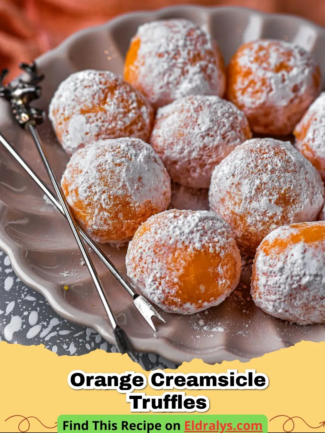 A close-up shot of Orange Creamsicle Truffles coated in orange sugar and white chocolate drizzle.