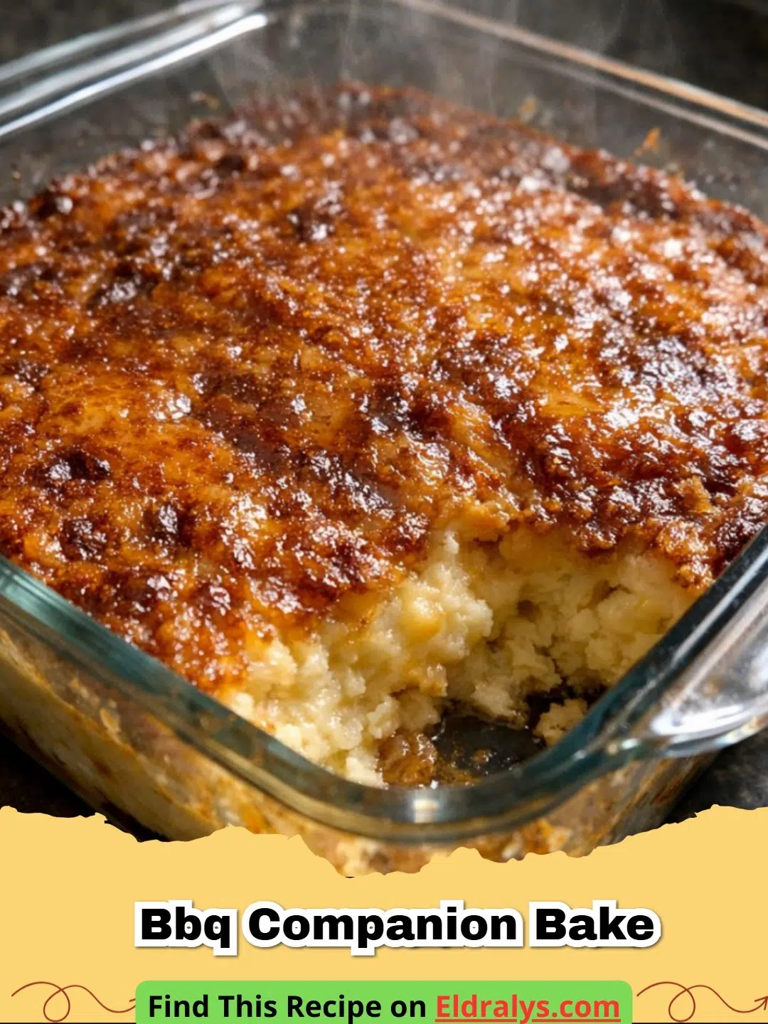 A bubbling dish of cheesy BBQ Companion Bake topped with golden crust and fresh chives.